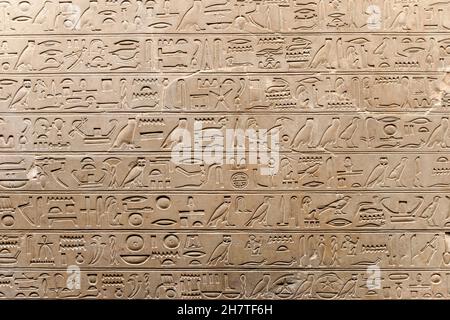 Hiéroglyphes égyptiens et dessins anciens sur des tablettes d'argile et fond papyri.L'art de l'Égypte et les civilisations anciennes de l'Afrique.Photo de haute qualité Banque D'Images