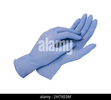 Gants médicaux.deux gants chirurgicaux bleus isolés sur fond blanc avec les mains.Fabrication de gants en caoutchouc, la main humaine porte un gant en latex Banque D'Images