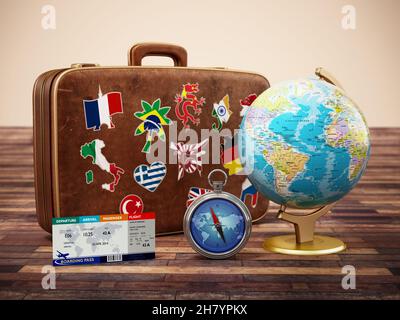 Valise vintage avec drapeaux des pays du monde, globe, boussole et billets d'avion.Illustration 3D. Banque D'Images