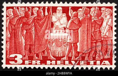 SUISSE - VERS 1938: Un timbre imprimé en Suisse montre le Premier Pacte fédéral, Charte fédérale, 1291, la naissance de l'ancienne Confédération suisse, Banque D'Images