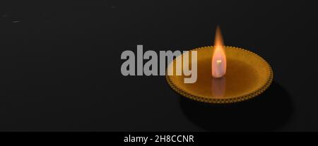 Diwali, festival hindou des lumières.Diya d'argile illuminée dans les vacances de Dipavali, bougie d'huile traditionnelle sur fond sombre, espace, modèle.3 Banque D'Images