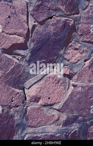 Vieux mur fait des décombres, arrière-plan texturé avec espace vide pour votre texte. Banque D'Images