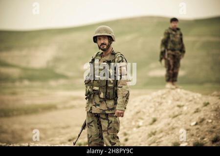 Soldat de l'Armée nationale afghane en patrouille avec la 3e unité des Forces spéciales de Kandak le 15 mai 2010 dans la province de Faryab, en Afghanistan. Banque D'Images