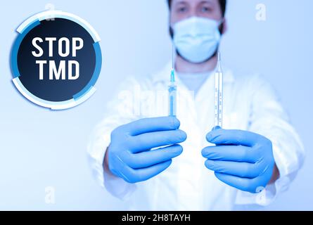 Panneau d'écriture à la main Stop TMD.Concept signification prévenir le désordre ou le problème affectant les muscles de mastication scientifique de recherche présentant la nouvelle médecine Banque D'Images