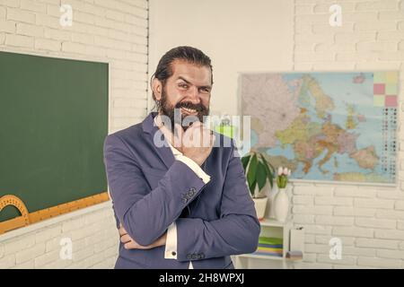 brutal non shaven guy professeur d'université dans la classe, l'éducation Banque D'Images