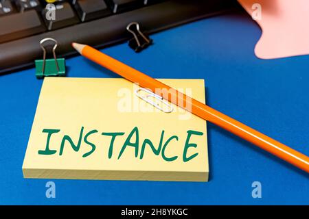 Texte montrant l'instance d'inspiration.Mot pour un exemple ou une occurrence unique d'une situation particulière Bureau de collection multiple assorti Banque D'Images