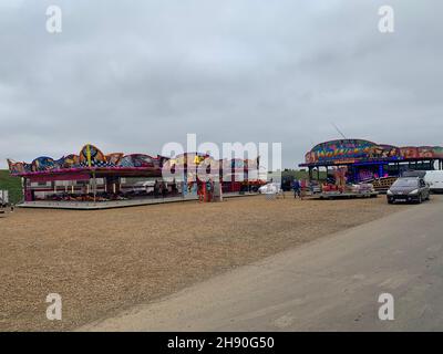 Santa Pod speedway Poddington Bedfordshire Royaume-Uni fairground jeux enfants piste voitures vitesse voiture tours rapides enfants jouer voiture voitures route Banque D'Images