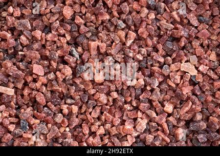 Pierres médieraires rouges naturelles et roches granit fond sol horizontal gros plan Banque D'Images