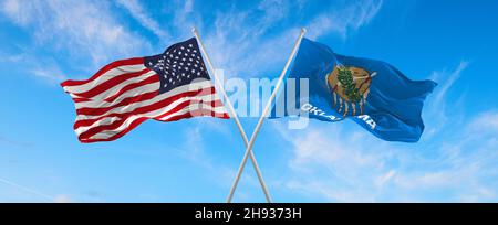 Deux drapeaux des États-Unis et de l'État de l'Oklahoma agitant dans le vent sur des mâts de drapeaux contre le ciel avec des nuages le jour ensoleillé.illustration 3d Banque D'Images