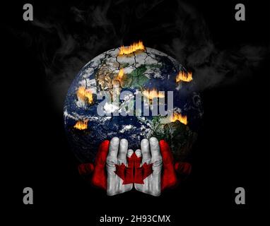 Les mains peintes avec le drapeau canadien tenant une planète stressée en crise.Concept du rôle du Canada dans les crises climatiques; catastrophes naturelles, réchauffement de la planète Banque D'Images