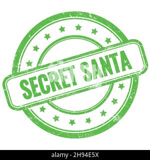 TEXTE DU PÈRE NOËL SECRET sur un timbre rond en caoutchouc vert vintage grungy. Banque D'Images