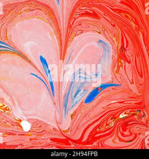 Peinture abstraite.Art moderne peinture en marbre.Peintures turquoise, rouge et rose mélangées.Arrière-plan inhabituel pour l'affiche, la carte de vœux, l'invitation. Banque D'Images