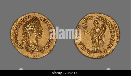 Aureus (coin) représentant l'empereur Commodus, 180, publié par Commodus.Inverse : Liberalitas tenant un abacus et une cornucopia.Minted à Rome. Banque D'Images