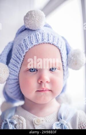 Cutie avec un joli les cheveux blonds et les yeux bleus d'un Banque D'Images