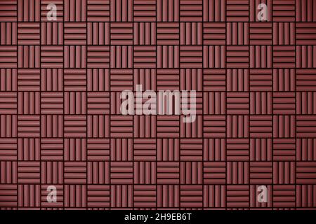 Mur de carreaux rouges avec motif géométrique comme matériau d'arrière-plan Banque D'Images