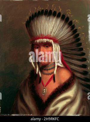 Petalesharro, un Pawnee Brave.1822 peinture de Charles Bird King.Sur présentation dans la bibliothèque de la Maison Blanche.Son capot de plumes est probablement le premier jamais peint par un artiste blanc.Petalesharo (c.1797 – c.1836) était un chef ou un brave de Skidi Pawnee qui a sauvé une fille 'Ietan', c'est-à-dire une fille Comanche,[3]: 159 d'un sacrifice humain rituel autour de 1817 (dans le Nebraska actuel) et a gagné la publicité pour son acte dans les journaux nationaux.En 1821, il a été l'un des nombreux chefs tribaux des grandes plaines à se rendre à Washington, D.C., dans le cadre de la délégation O'Fallon où ils ont rencontré le président James Monroe. Banque D'Images