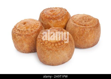 photo de studio de petits tourtes de porc coupées sur fond blanc - John Gollop Banque D'Images