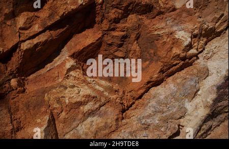 arrière-plan en pierre aux teintes rougeâtres, gros plan Banque D'Images