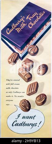 Une publicité de décembre 1950 dans un magazine pour les chocolats Cadbury's Milk Tray. Banque D'Images