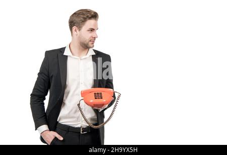 Un moyen classique de garder le contact.Téléphone de garde du gestionnaire.Homme professionnel utilise un téléphone vintage Banque D'Images