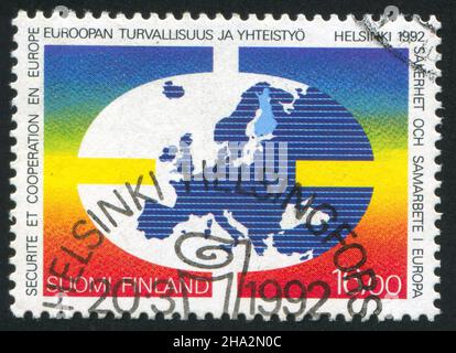 FINLANDE - VERS 1992: Timbre imprimé par la Finlande, montre Globe, vers 1992 Banque D'Images