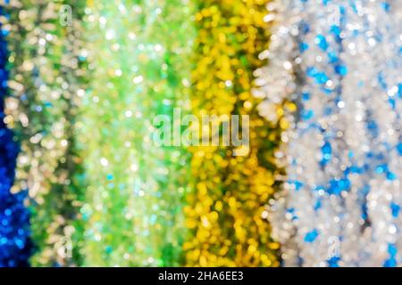 Image de Noël scintillante multicolore avec effet de flou artistique.Image de fête en arrière-plan.Photo plein écran. Banque D'Images