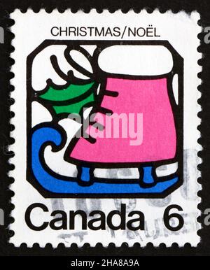 CANADA - VERS 1973 : un timbre imprimé au Canada montre le patinage sur glace, Noël, vers 1973 Banque D'Images