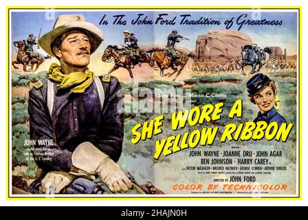 ELLE PORTAIT Un RUBAN JAUNE affiche du film rétro « il portait un ruban jaune » avec John Wayne, réalisé par John Ford John Wayne, Joanne Dru, John Agar, Ben Johnson, Harry Carey,Jr., 1949. Banque D'Images