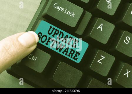 Logiciel de mise à jour du texte d'écriture manuscriteApproche d'affaires remplaçant le programme par une version plus récente du même produit compilation et dactylographie recherche en ligne Banque D'Images