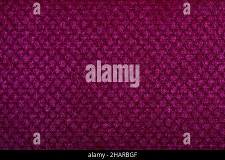 Texture de tissu violet. Textiles de rembourrage pour meubles. Motif gaufré. Fibres tissées. Le matériau est doux au toucher. Concept de minimalisme. Détail élevé Banque D'Images