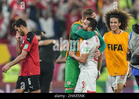 Doha, Qatar.15th décembre 2021.Les joueurs tunisiens célèbrent la victoire après le coup de sifflet final du match de football demi-finale de la coupe arabe de la FIFA entre la Tunisie et l'Égypte au stade 974.Credit: Ayman Aref/dpa/Alay Live News Banque D'Images