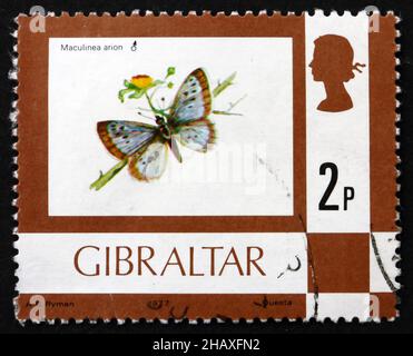 GIBRALTAR - VERS 1977: Un timbre imprimé à Gibraltar montre Grand Bleu, Maculinea Arion, papillon, vers 1977 Banque D'Images