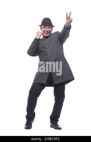 homme émotionnel dans un chapeau et un manteau d'automne . Banque D'Images