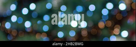 Arrière-plan des lumières de Noël bleu abstrait bokeh. Banque D'Images