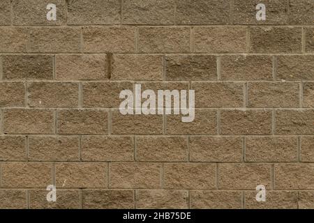 Mur de briques peint avec une peinture pêche pâle texture de la maçonnerie beau fond blanc. Banque D'Images