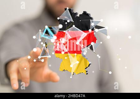 Une personne touchant le rendu 3D de la carte numérique de l'Allemagne Banque D'Images