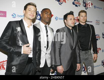 (l-r) Duncan James, Simon Webb, Antony Costa et Lee Ryan of Blue au Capital 95,8 Summertime ball avec Barclaycard au stade Emirates. Banque D'Images