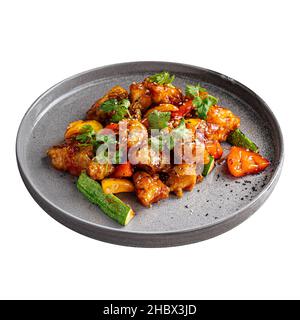 Poisson de zander asiatique isolé en sauce aigre-douce Banque D'Images