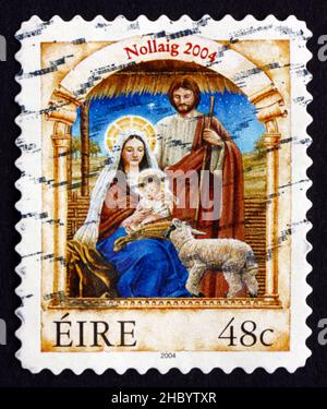 IRLANDE - VERS 2004: Un timbre imprimé en Irlande montre Sainte famille, Noël, vers 2004 Banque D'Images