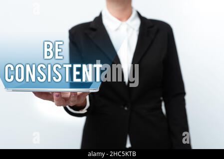 L'affichage conceptuel doit être cohérent.Mot écrit sur uniforme persistent ferme inaltérable même inchangeant Rapport présentant de nouvelles idées de technologie Banque D'Images