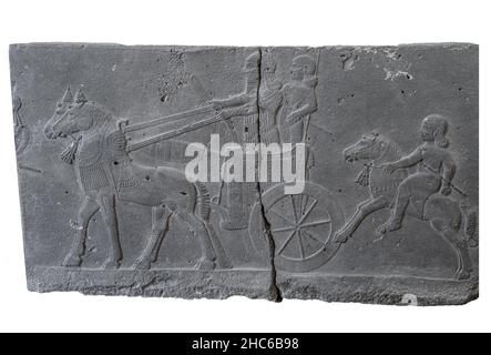 Orthostat de char et de pilotes de l'époque assyrienne. Banque D'Images