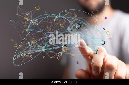 Main touchant les points flottants avec des cordes de connexion. Banque D'Images