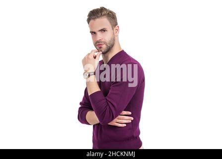 À la barbe ou pas à la barbe.Le beau homme touche le menton non rasé.Toilettage pour hommes.Coupe de cheveux Banque D'Images