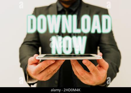 Légende conceptuelle Télécharger maintenant.Mot écrit sur pour copier ou déplacer des programmes ou des informations dans un autre appareil présentant des idées de nouvelles technologies Banque D'Images