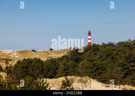 Le soleil brille sur le phare de l'île de la mer du nord d'amrum Banque D'Images