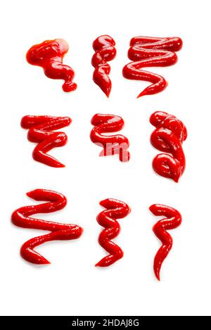 Éclaboussures de ketchup isolées sur fond blanc. Banque D'Images