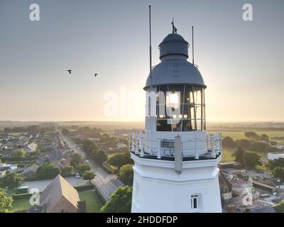 Coucher de soleil à travers la fenêtre du phare Banque D'Images