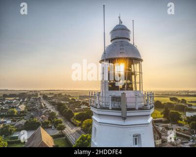 Coucher de soleil à travers la fenêtre du phare Banque D'Images