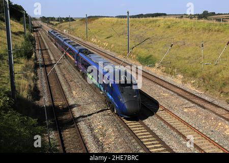 Hull trains 802301 train de classe Paragon, East Coast main Line Railway, près du village d'Essendine, comté de Rutland, Angleterre, Royaume-Uni Banque D'Images