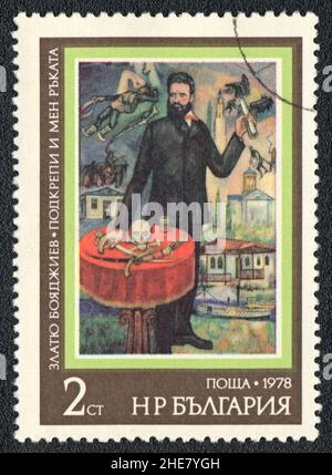 Un timbre imprimé en Bulgarie montre une peinture de l'artiste Zlatyu Boyadzhiev support et ma main, vers 1978 Banque D'Images